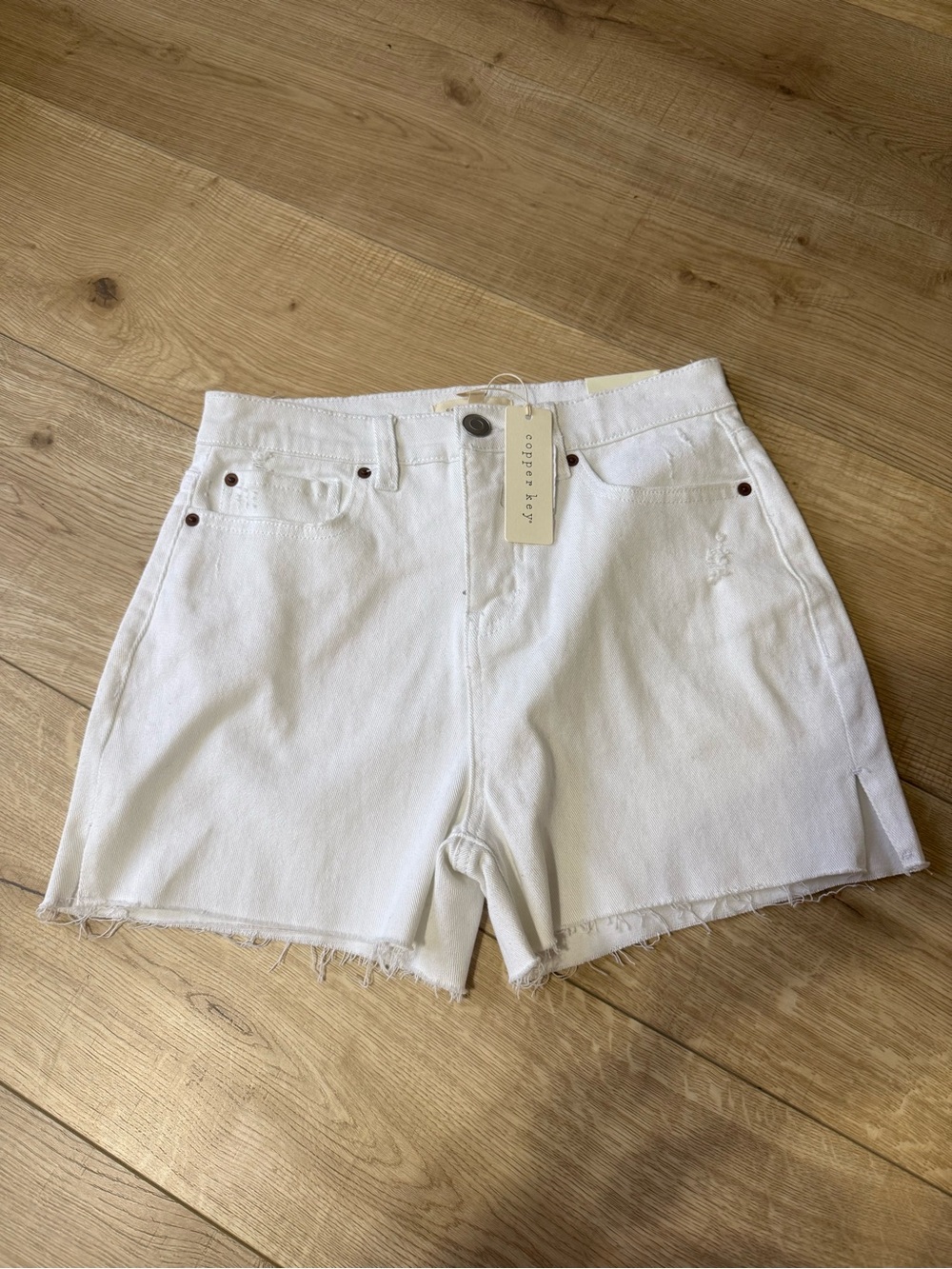 Copper key High-Rise White Denim Shorts with Raw Hem